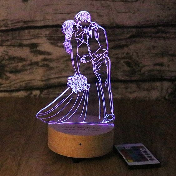 Centro de mesa personalizado fabricados con aclilico marcados en laser y luces led RGB, ideal para resaltar el eventos.