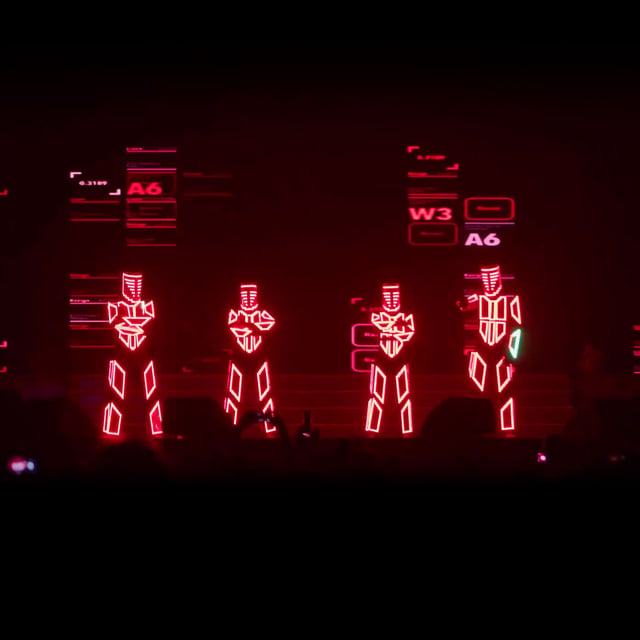 Show de bailarines Lightman con trajes LED rojos