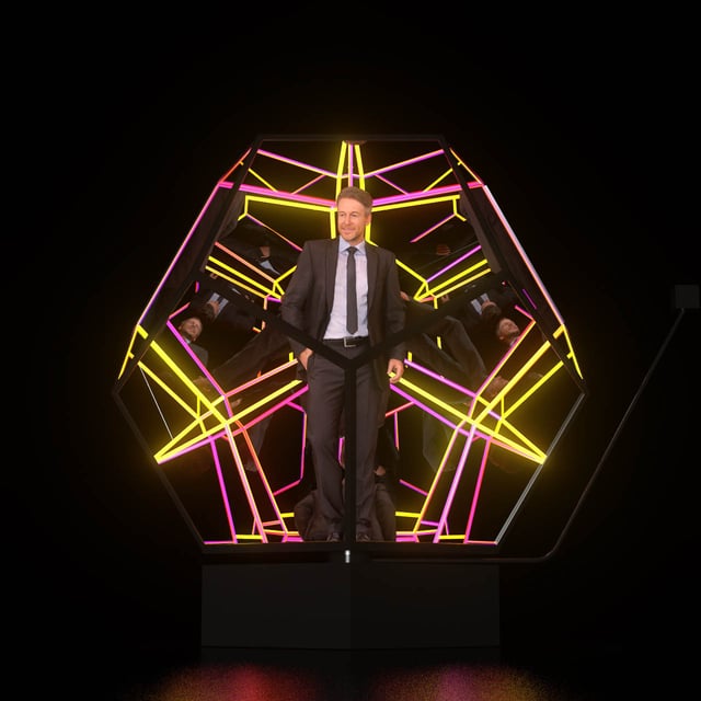 Imagen del Dodecaedro de dos metros de diámetro iluminado desde su interior con luces pixel led y sus 12 caras de cristal reflectivo, creando una sensación de profundidad infinita.